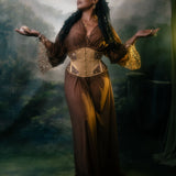 Ihuoma Founder wears Kauri Waspie In Gold paired with Kauri Mesh & Embroidery Robe