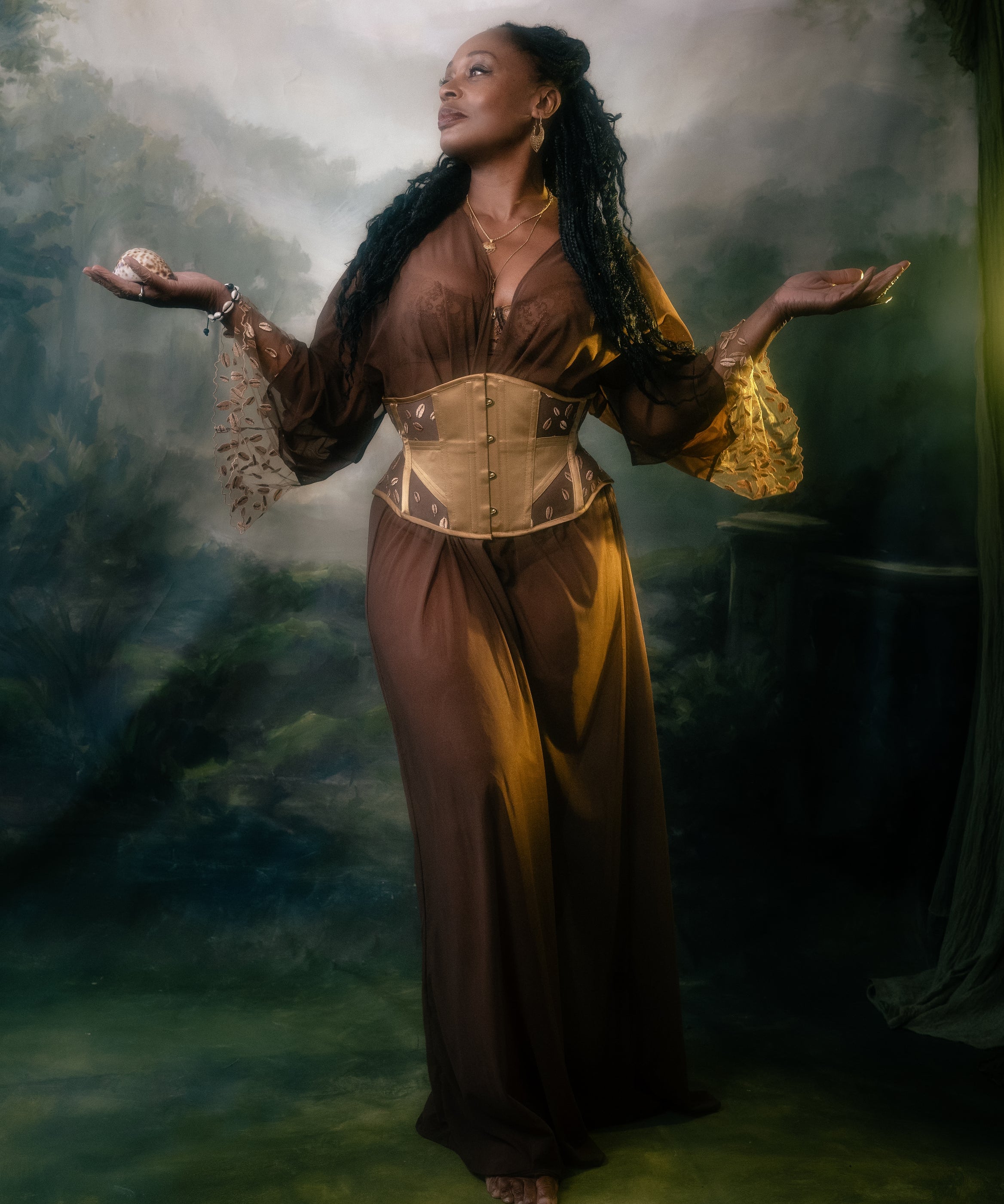 Ihuoma Founder wears Kauri Waspie In Gold paired with Kauri Mesh & Embroidery Robe