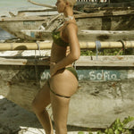 Model wearing Ihuoma's Nairobi Silk Balconette Bra, Nairobi Silk Brief and Nairobi Garters - side view
