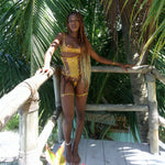 Model wears Ihuoma x Orchid Corsetry Kauri Gold corset paired with Zanzibar Quarter Cup, thong and garter belt - 2