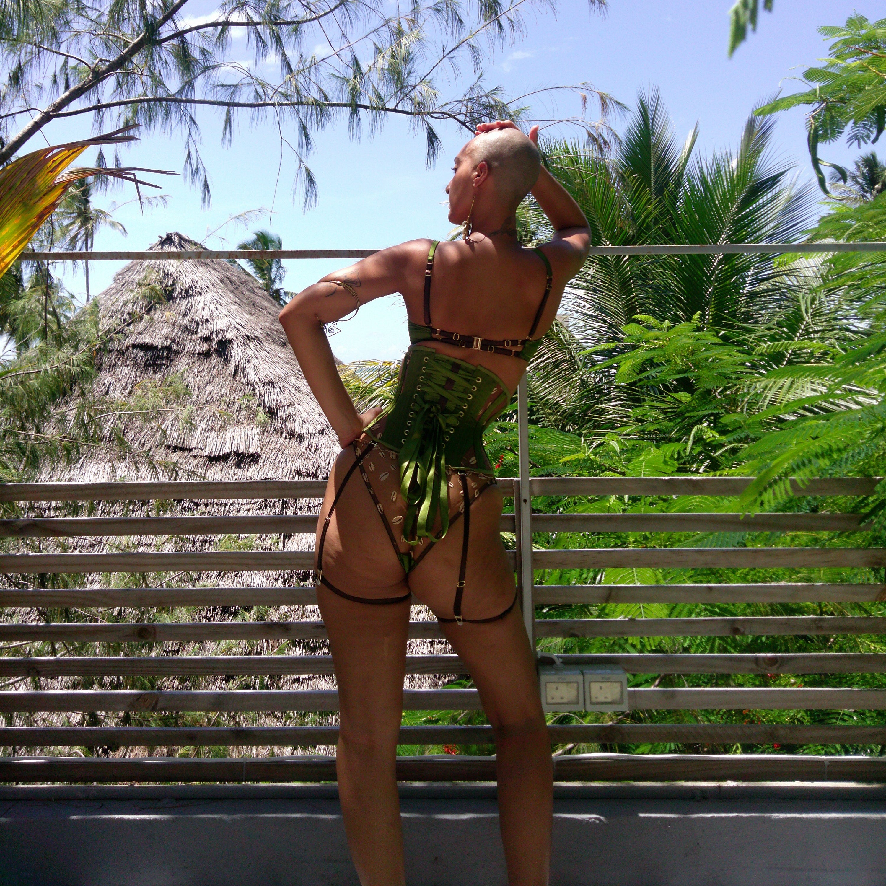 Model wears Kauri Waspie in Jungle Green paired with Nairobi Embroidery lingerie set - back details