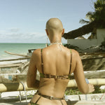 model wearing Nairobi Silk balconette, paired with Nairobi Silk Suspender, brief - back view 